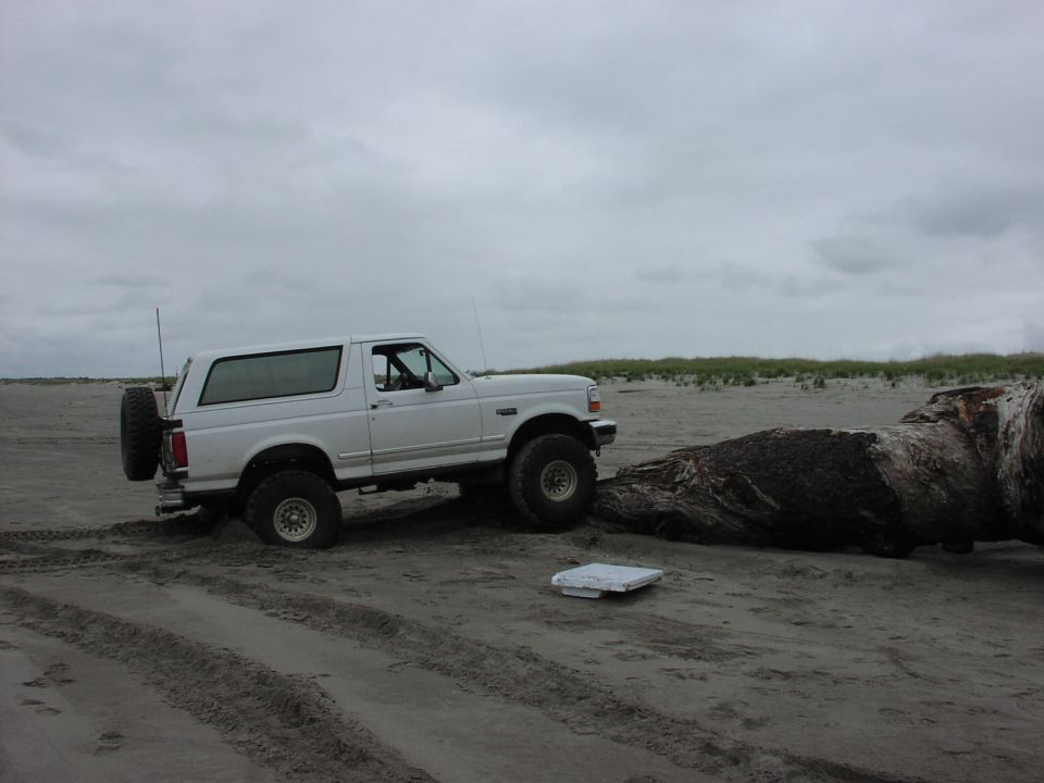 Suspension flexing on log.
It's a no show without front locker.
(by The Heyer's, 5/20/2006)