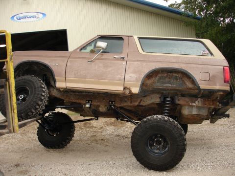 1987 Ford Bronco - This modified 1987 Ford Bronco features a significant lift kit and oversized tires, its off-road capabilities.