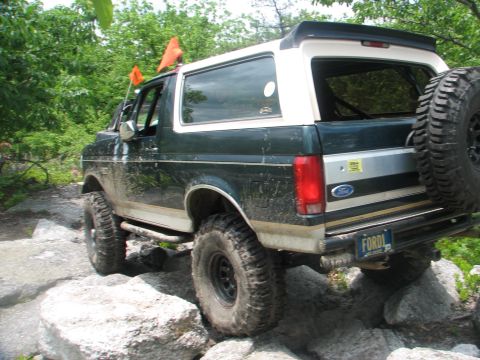 1992 Ford Bronco - This 1992 Ford Bronco navigates a rocky trail, its off-road capabilities.