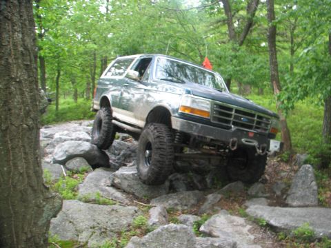1992 Ford Bronco - This 1992 Ford Bronco tackles a challenging rocky path, its off-road capabilities.