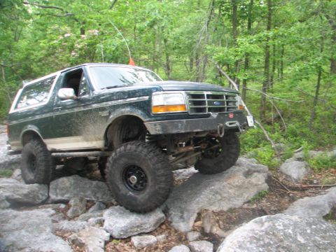 1992 Ford Bronco - This 1992 Ford Bronco is equipped for off-road adventures, with modifications visible on its suspension and tires.