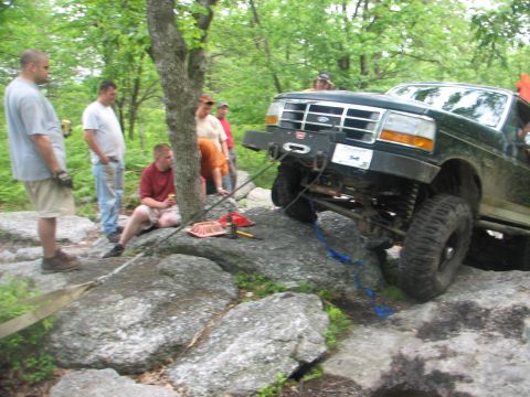 1992 Ford Bronco - Ford Bronco tackles rocky terrain during an off-road excursion.