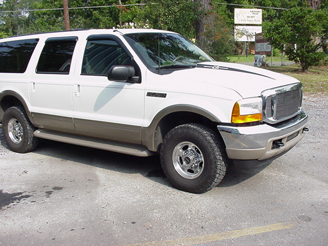 White 2000 Ford Excursion SUV, 3/4 front view
