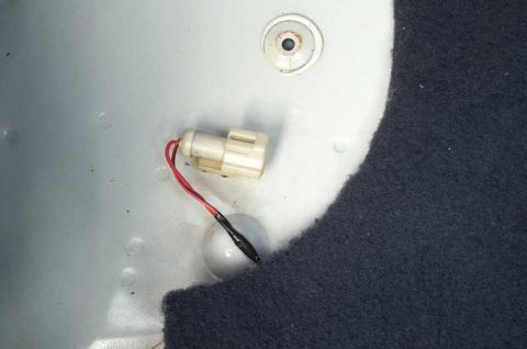 2001 Ford Crown Victoria - Found this connector under the rear seat's carpeting and padding. There is one on each side. What is their purpose?