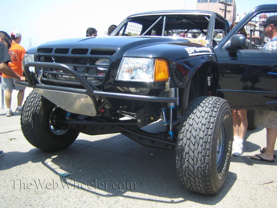 Black Ford Ranger prerunner front view with tube bumper and long-travel suspension