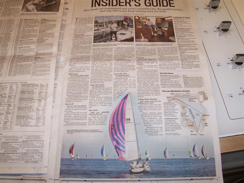 Newspaper article with photos of sailboats and text about sailing
