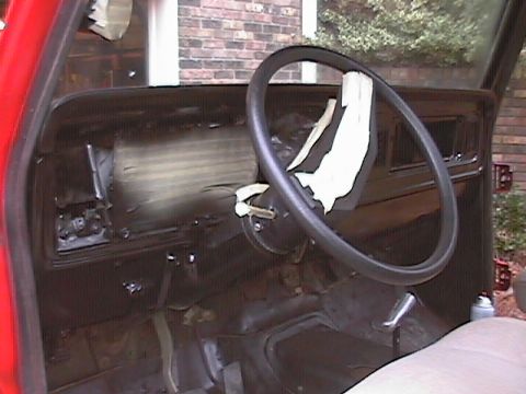 1979 Ford Bronco - Interior view of a 1979 Ford Bronco, highlighting the dashboard and steering wheel.