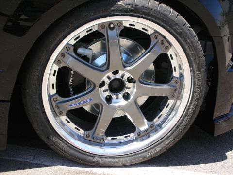 1992 Ford Crown Victoria - The image focuses on a custom wheel, not the entire vehicle, making year identification impossible.