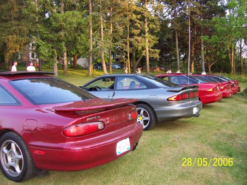 1996 Ford Probe - A line of Ford Probe cars parked on grass during a meet on 28/05/2006.