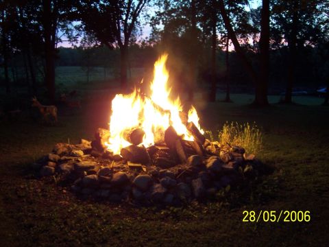 1996 Ford Probe - A large bonfire burns brightly in a rural setting at twilight, with a date stamp of 28/05/2006 visible.