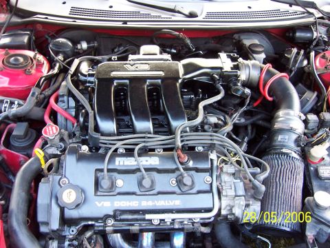 1996 Ford Probe - Engine bay photo showing a Mazda V6 DOHC 24-valve engine, dated 28/05/2006.