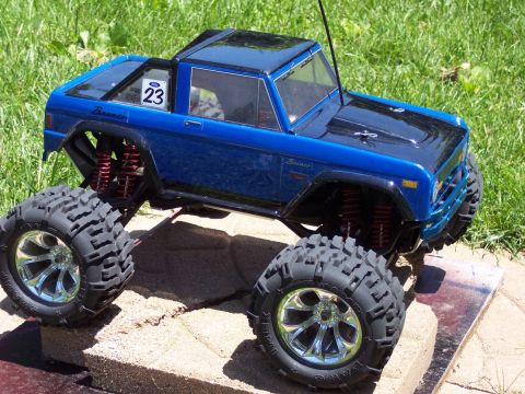 1974 Ford Bronco - RC monster truck resembling a Ford Bronco, modified with large off-road tires and suspension.