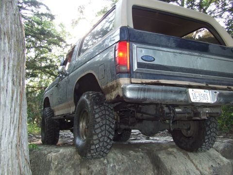 1986 Ford Bronco - This 1986 Ford Bronco navigates a rocky trail, its off-road capabilities.