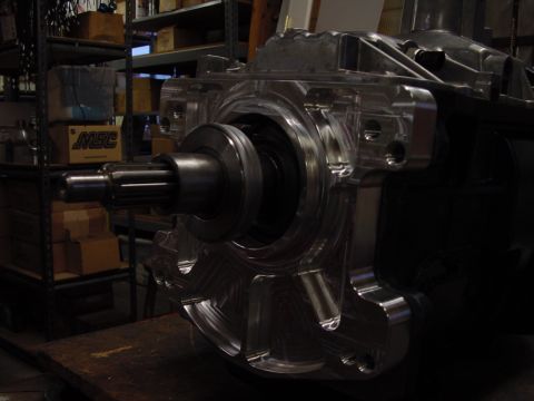 1979 Ford Bronco - Polished metal transmission part with a splined shaft is shown in detail.