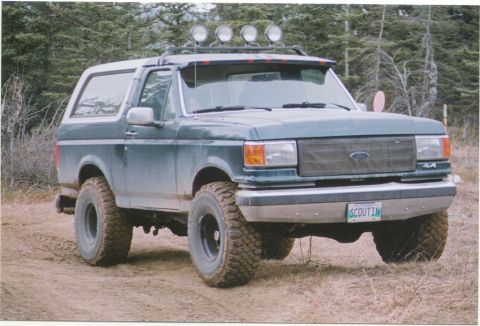 1988 Ford Bronco - This Ford Bronco is equipped with off-road tires and a light bar on the roof.