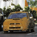 1994 Ford Probe - This Subaru WRX appears to be heavily rusted and in poor condition.