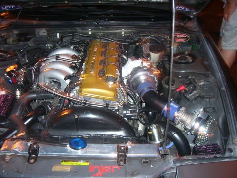 1994 Ford Probe - Customized Nissan SR20DET engine with aftermarket turbocharger and intercooler piping.