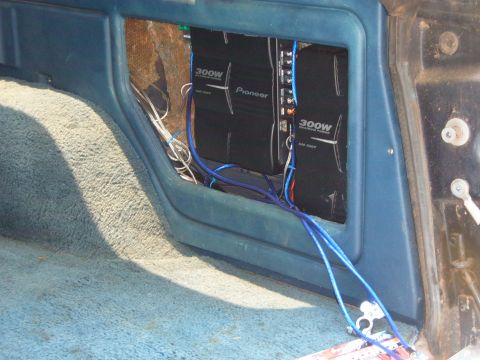1993 Ford Bronco - Two Pioneer 300W amplifiers are visible inside the car's interior paneling.