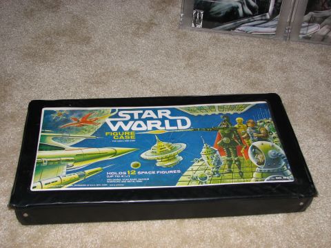 1991 Ford Bronco - A vintage Star World Figure Case is displayed on a carpeted surface.