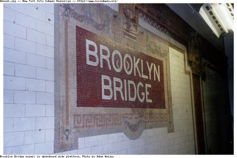 1986 Ford Bronco - Mosaic artwork spelling out "Brooklyn Bridge" on a tiled wall in an abandoned subway platform.