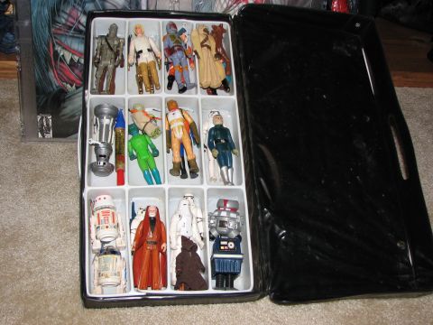 1991 Ford Bronco - Collection of vintage Star Wars action figures organized in a compartmentalized carrying case.
