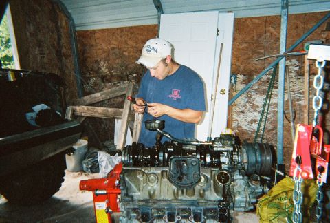 1988 Ford Bronco - My buddy Joe inspecting something we pulled out of the oil pump pick up tube. It was black and about the size of two postage stamps/. Notic…