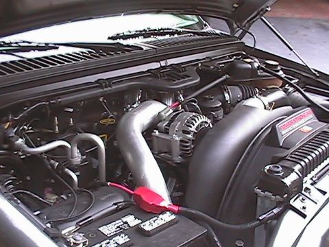 2005 Ford F-250 - Close-up of an engine bay, showing the "POWER STROKE V8" engine cover.