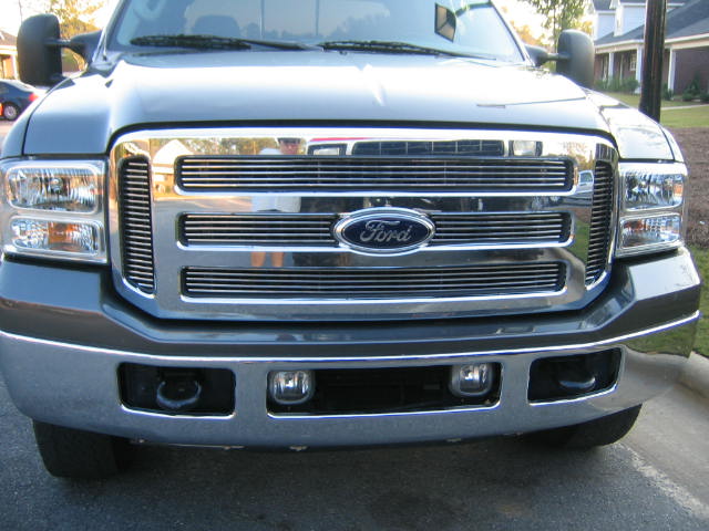 Front view of a 2005 Ford F-250 Super Duty truck, showing the grille and headlights