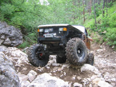 1981 Ford Bronco - This heavily modified 1981 Ford Bronco navigates a challenging rocky trail.