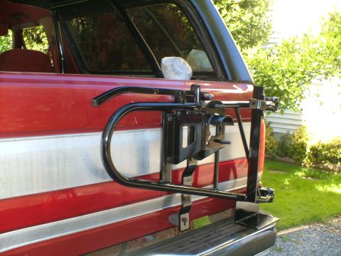 1989 Ford Bronco - Rear view of a 1989 Ford Bronco showing its spare tire carrier attachment.