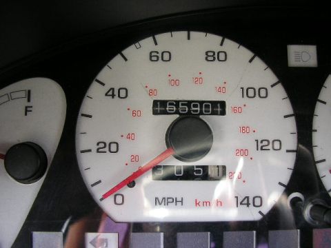 1994 Ford Probe - Dashboard gauges display mileage of 65,901 miles and a speed of 0 mph.