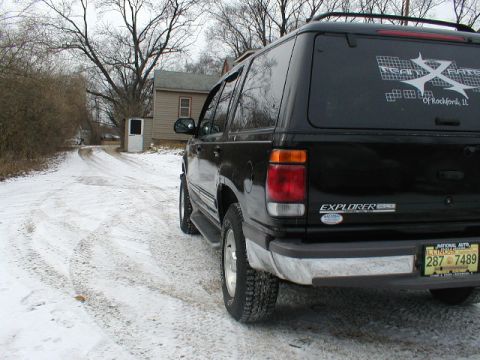 1998 Ford Taurus - Getting ready to try on the DUBS.