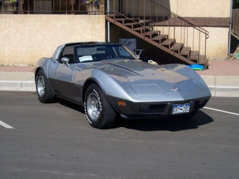 1972 Ford Ranchero - This Chevrolet Corvette C3, likely a 1975 model, is seen from a three-quarter front view. The license plate reads 637-1S1.