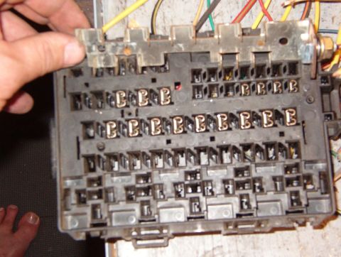 1983 Ford Bronco - The bus bar must be lifted evenly so all the tabs come out of their slots at the same time. The fuses connected to the bus bar are hot at a…