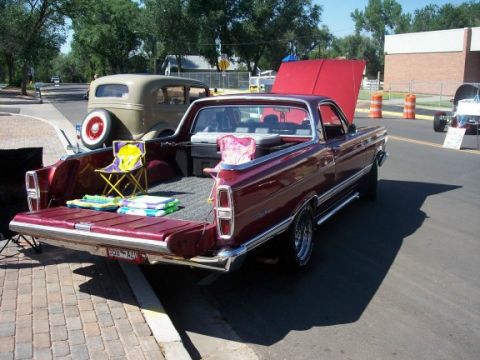 1972 Ford Ranchero - Maroon 1968 Ford Ranchero with tailgate down, parked next to a vintage sedan.
