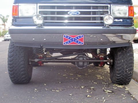 1991 Ford Bronco - Front view of a 1991 Ford Bronco with aftermarket suspension and tires.