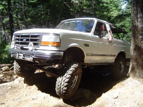 1989 Ford Bronco - This 1989 Ford Bronco is navigating a challenging off-road trail.