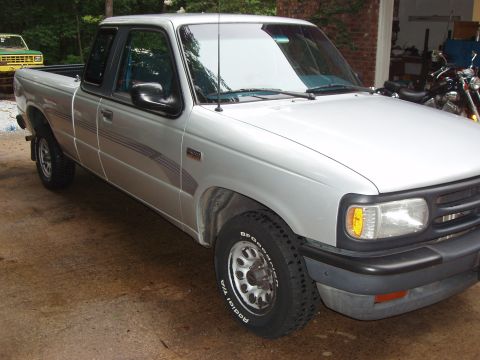 1994 Mazda B3000 - This 1994 Mazda B3000 pickup truck is shown from the front three-quarter view.