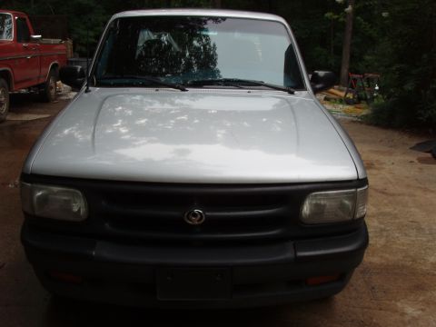 1994 Mazda B3000 - Front view of a silver 1994 Mazda B3000 pickup truck parked outdoors.