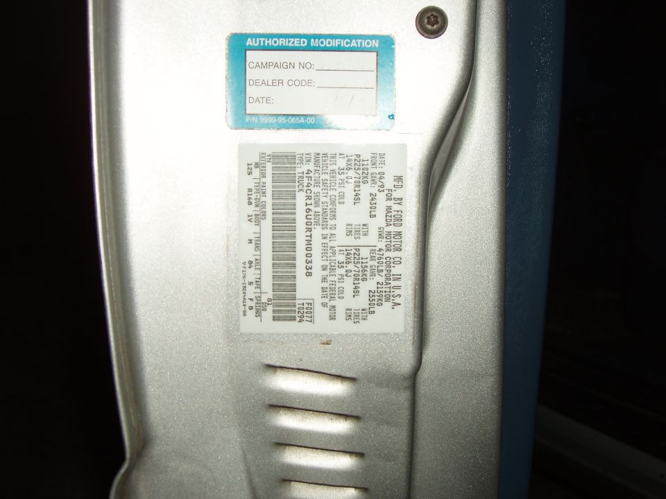 Door jamb label: Ford-built for Mazda, 04/93 build date, GVWR and tire specs