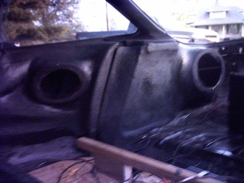 1995 Ford Probe - Interior view of a car's dashboard with speaker cutouts and wiring visible.