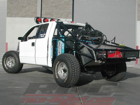 1984 Ford Bronco - Custom off-road truck with extensive modifications for desert racing.