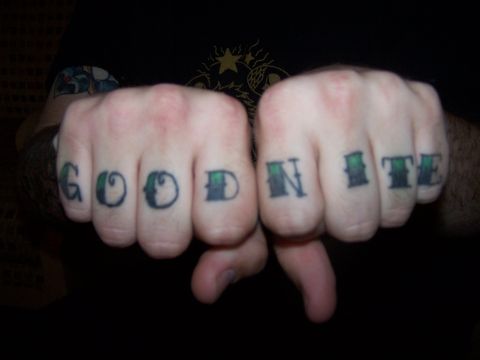 1995 Ford Probe - Tattooed knuckles spell out "GOOD NITE" against a dark background.