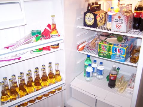 1995 Ford Probe - Inside of a refrigerator filled with various alcoholic and non-alcoholic beverages.