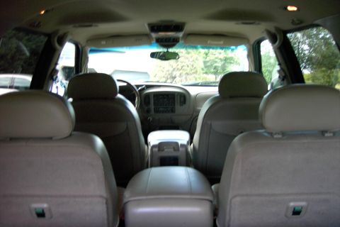 1996 Mercury Grand Marquis - The interior of an SUV is shown, looking forward from the rear seats.