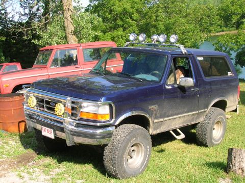 1994 Ford Bronco - This 1994 Ford Bronco is parked outdoors next to another Ford Bronco.