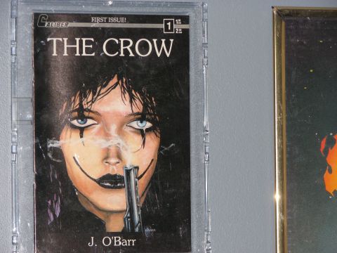 1991 Ford Bronco - The Crow comic book cover displays artwork by J. O'Barr, depicting a character with face paint and a gun.