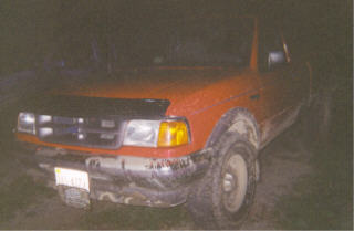 1997 Ford Ranger - Front view of an orange 1997 Ford Ranger pickup truck.