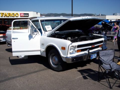 1972 Ford Ranchero - This white pickup truck appears to be from the early 1970s, possibly a 1971 model.