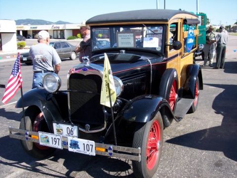 1972 Ford Ranchero - A 1929 Ford Model A Delivery Car is displayed at an outdoor event.